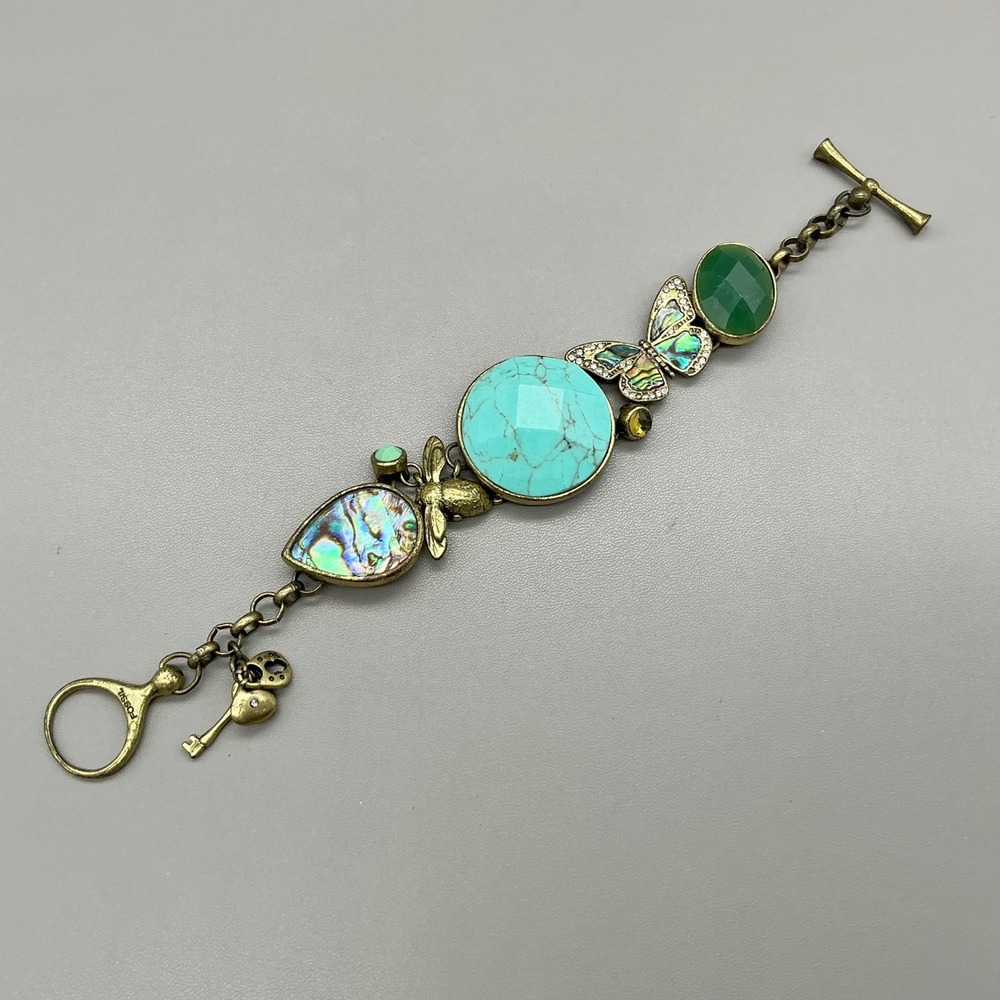 Fossil Bracelet Womens Gold Tone Turquoise Abalone Butterfly Bee Charms 8.25"